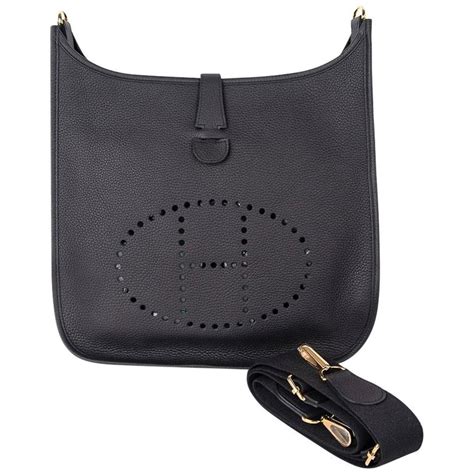 hermes black and gold evelyne|authentic hermes evelyne bag.